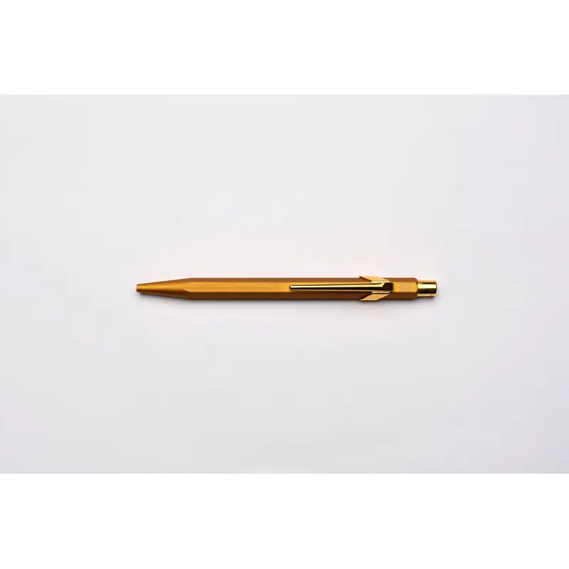 Caran d'Ache 849 Metal Ballpoint Pen - Goldbar With Metal Slim Pack Case